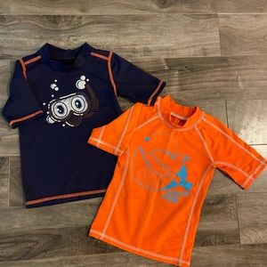 3/ $10👍 2 pack - short sleeve Kids swimm guard.